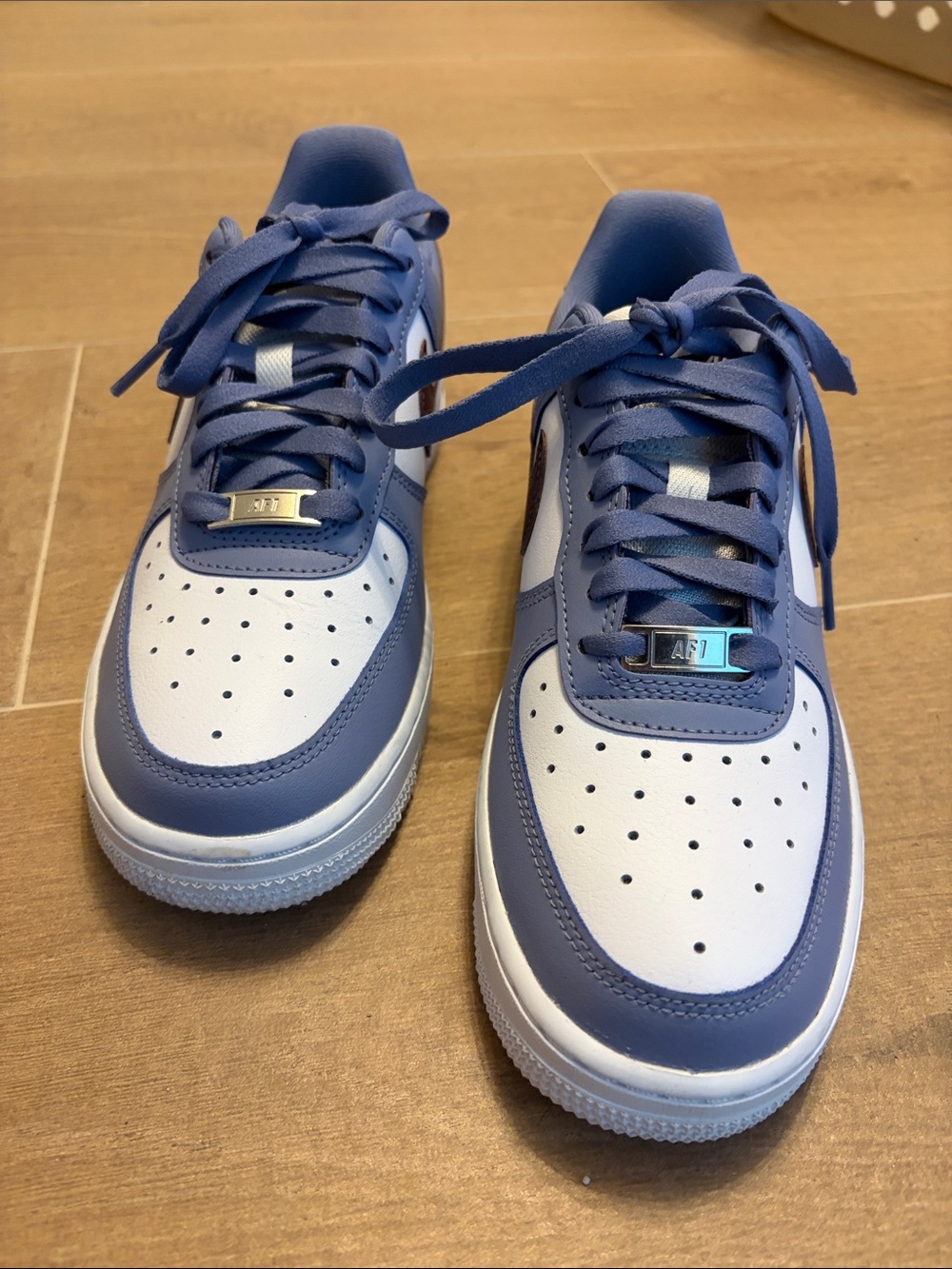Nike Women’s Low-Top Sneakers in White and Blue